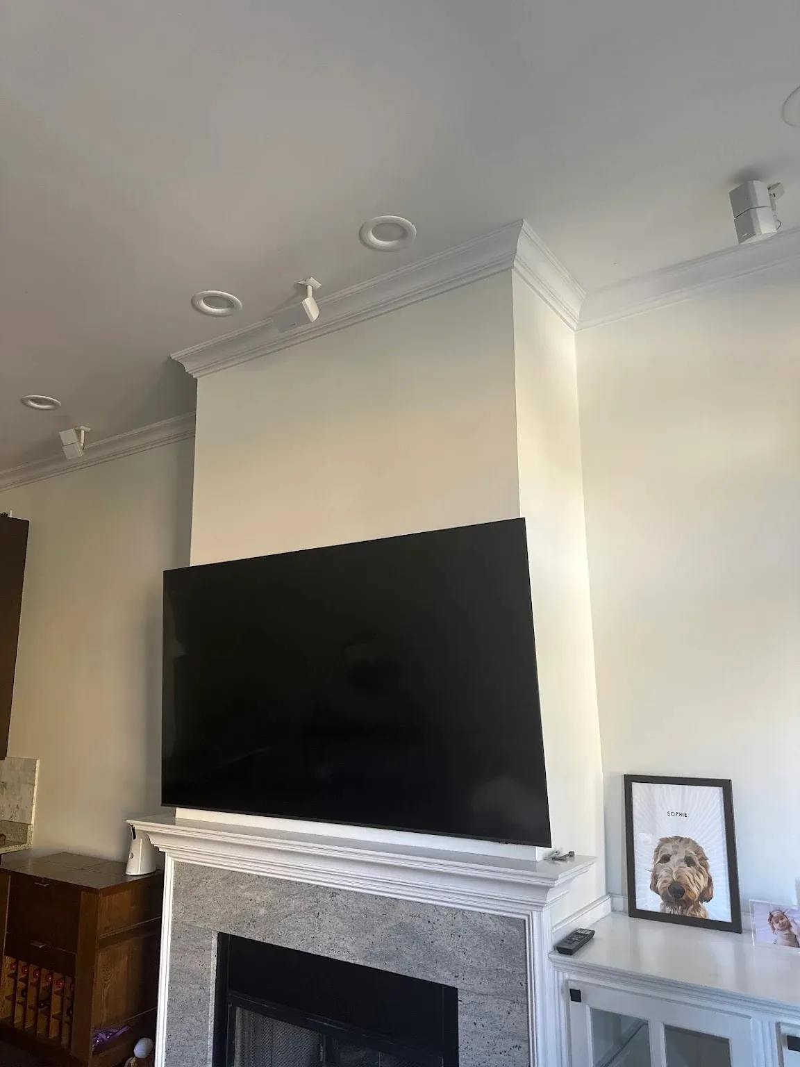 Wall-mounted TV installation by Carlo F