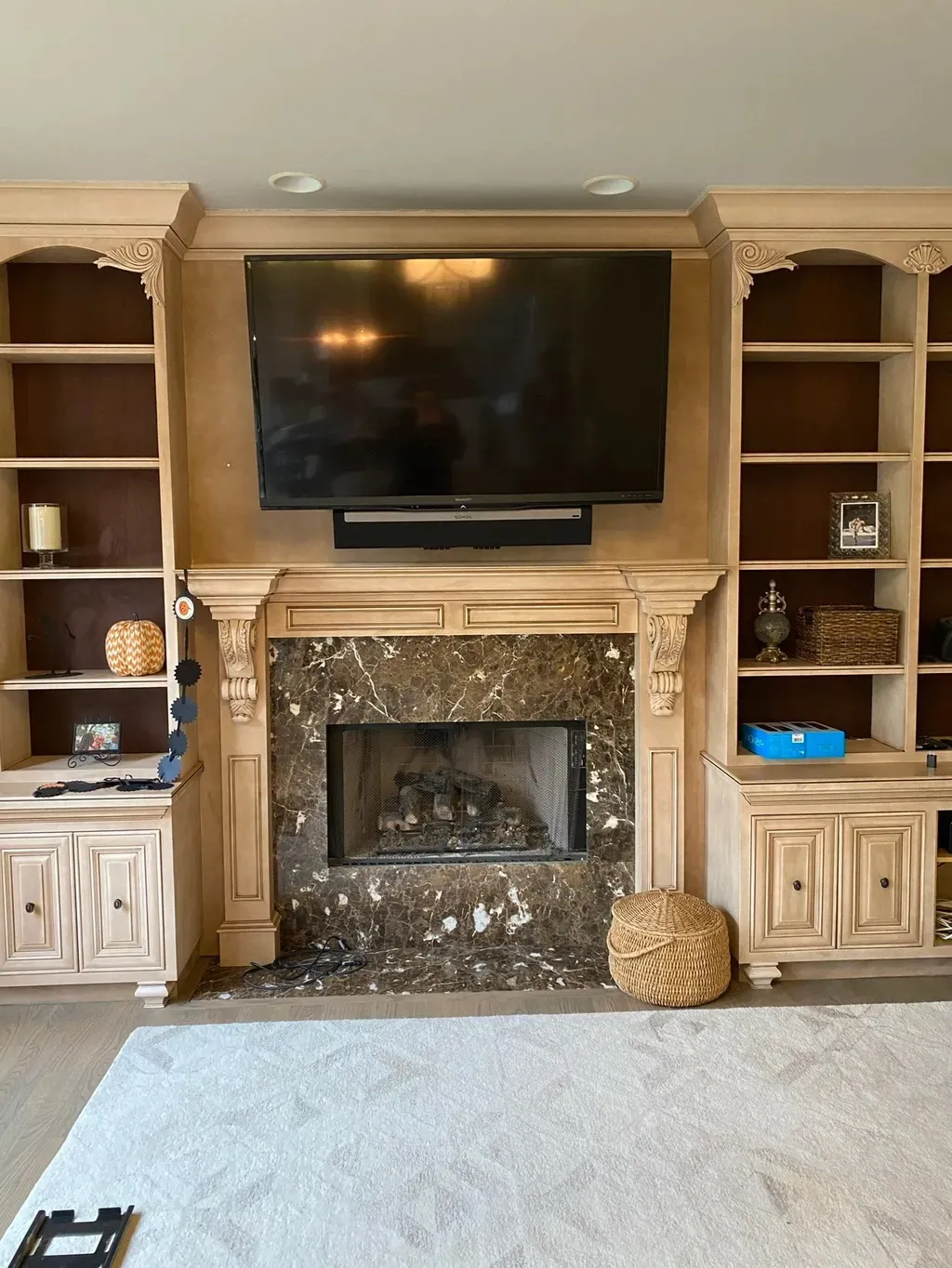 TV mounted above mantel with clean finish